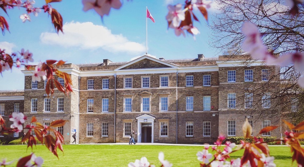 Conference Banner - The Fielding Johnson Building in spring